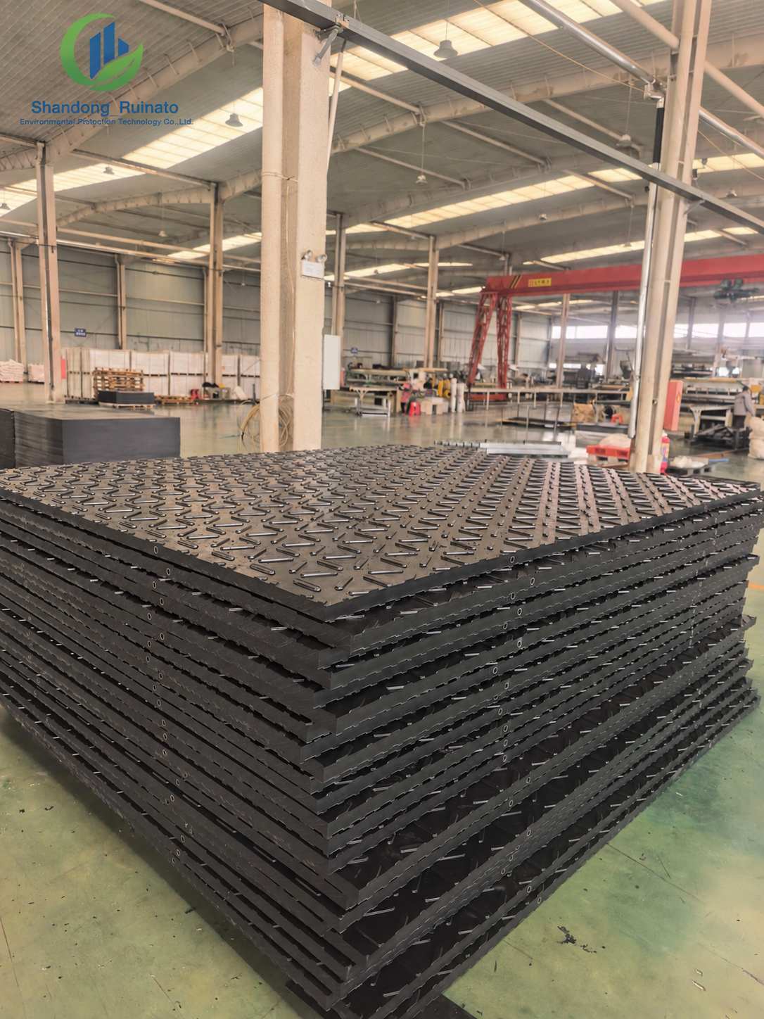 How Should Buyers Verify Heavy Duty Ground Protection Mats Quality Before Mass Production?插图2 Stacked heavy-duty ground protection mats in factory storage before shipment